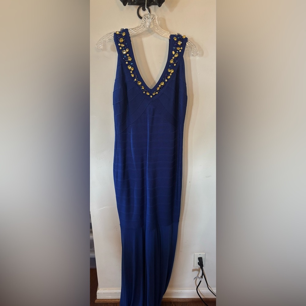 Elegant Blue Sleeveless Dress with Embellished Neckline